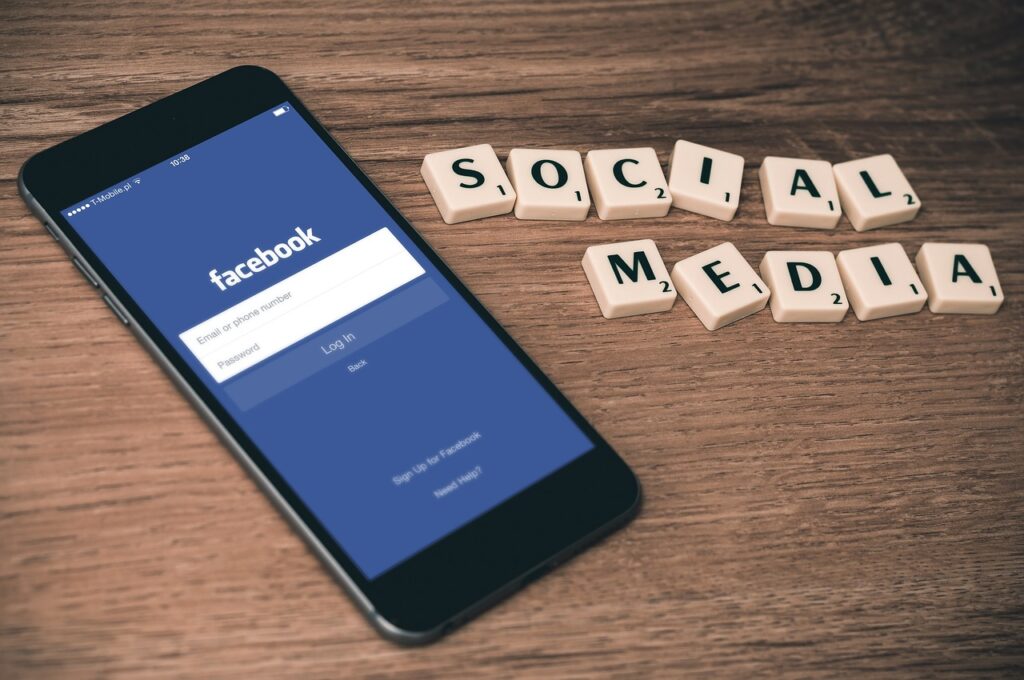 An image of a mobile phone with Facebook opened.